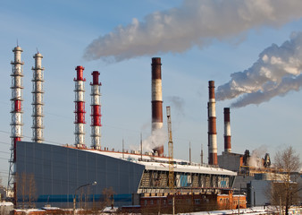 Industrial landscape.Pipe with smoke .