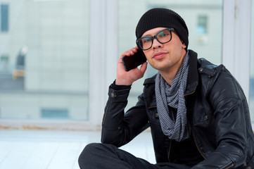 Young man talking on the phone