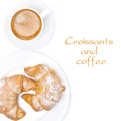 fresh croissants and cup of coffee isolated, top view