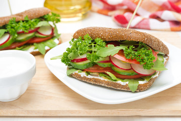 sandwich with cottage cheese, greens and vegetables