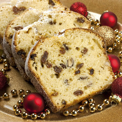 Christmas stollen with several ingredients, selective focus