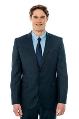 Smart businessman posing casually