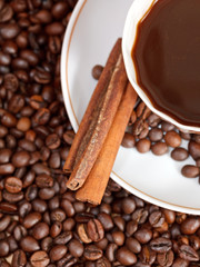 cup of coffee and roasted beans