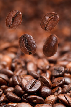 four falling beans and dark roasted coffee