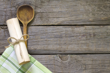Abstract food background on vintage boards with wooden spoon