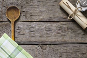 Abstract food background on vintage boards with wooden spoon