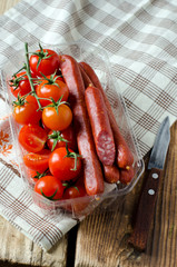 Smoked sausage and cherry tomatoes