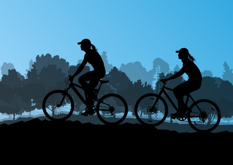 Active cyclists bicycle riders in wild forest nature landscape b