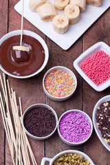 banana with melted chocolate, fondue with banana