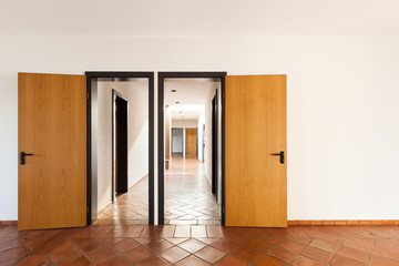 Architecture, interior, empty room with two doors.