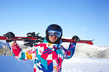 Fototapeta na wymiar Man with skis.