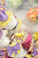 Fresh fancy cakes on a stand.