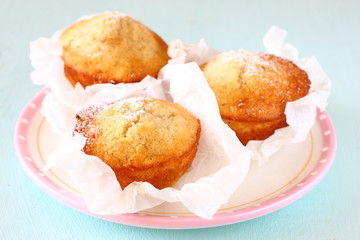 fresh baked healthy homemade muffins on vintage plate