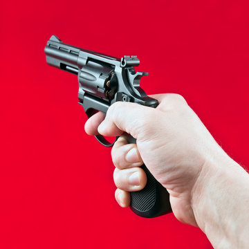 hand with revolver