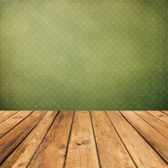 Vintage wooden planks over grunge green background