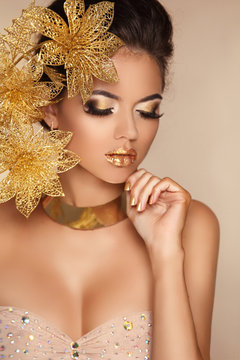 Glamour Makeup. Girl Face Close-up. Beauty Portrait Woman with g