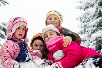 Fototapeta na wymiar Group of children in snow