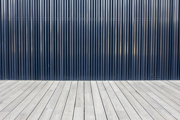 Background: Wooden floor and Metal Wall