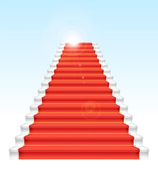 Front staircase and red carpet. On blue sky background.