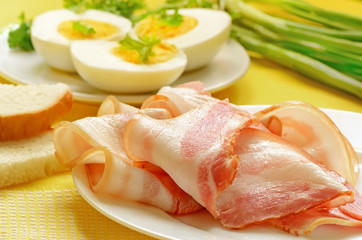 Breakfast with bacon and eggs