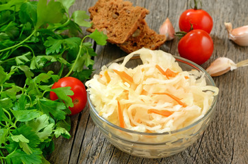 Sauerkraut on wooden table