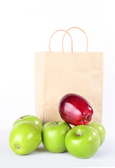 Red and Green apples with paper bag