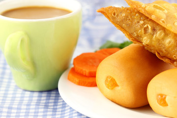 Snacks with cup of tea