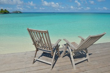 Fototapeta na wymiar tropical beach chairs
