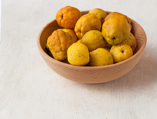 Harvest Japanese quince (Chaenomeles japonica)