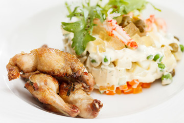 Russian salad with quail