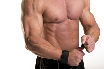 Fototapeta na wymiar Mężczyzna podczas treningu siłowego i budowy mięśni