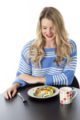 Young Woman Eating Mixed Vegetables