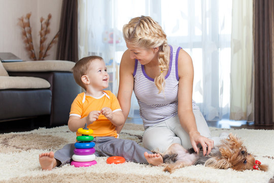 mother and kid have pastime together indoor