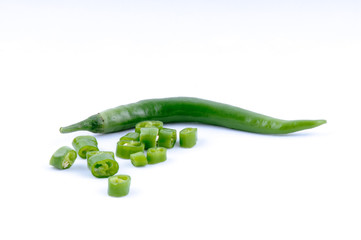 chopped green chilli on white background
