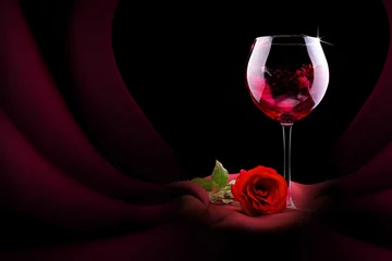 Papier Peint photo Vin glass of wine with red silk and flower