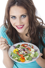 Young Woman Eating Stir Fried Vegetables
