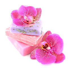 Soap and orchid isolated on white