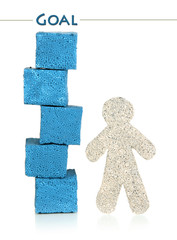 Little man and building blocks isolated on white