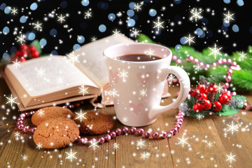 Composition of book with cup of coffee and Christmas