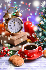 Composition of book with cup of coffee and Christmas