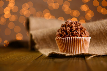 Tasty cupcake with butter cream,