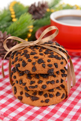 Sweet cookies with cup of tea on table close-up