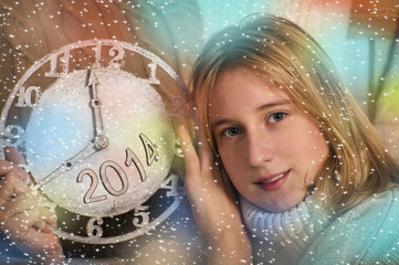 New Year's concept. Smiling girl showing clock