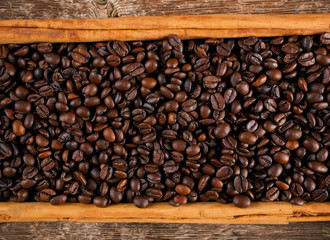 Frame with coffee beans and ceylon cinnamon