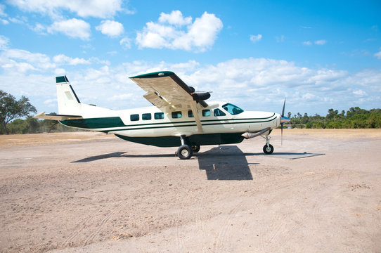 parked airplane on the landing runway in tanzania