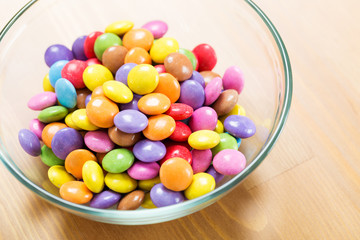 Colourful candy in bowl