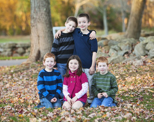 Portrait of friends in the park during the fall