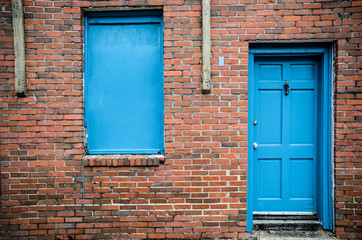 Blue door and windows, brick building, Treme, New Orleans