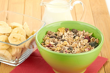 Delicious and healthy cereal in bowl with milk