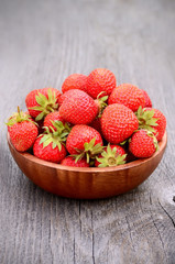 Strawberries on wooden table
